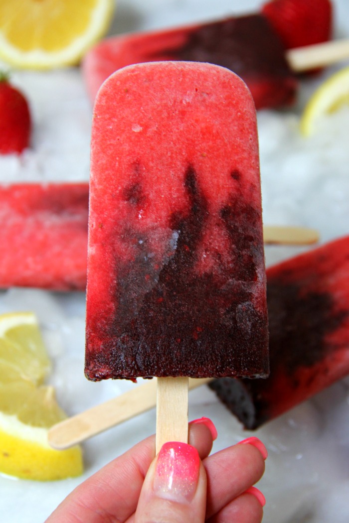 Very Berry Popsicles - Fresh strawberries swirled with blackberries and lemon make these homemade popsicles a truly refreshing treat!