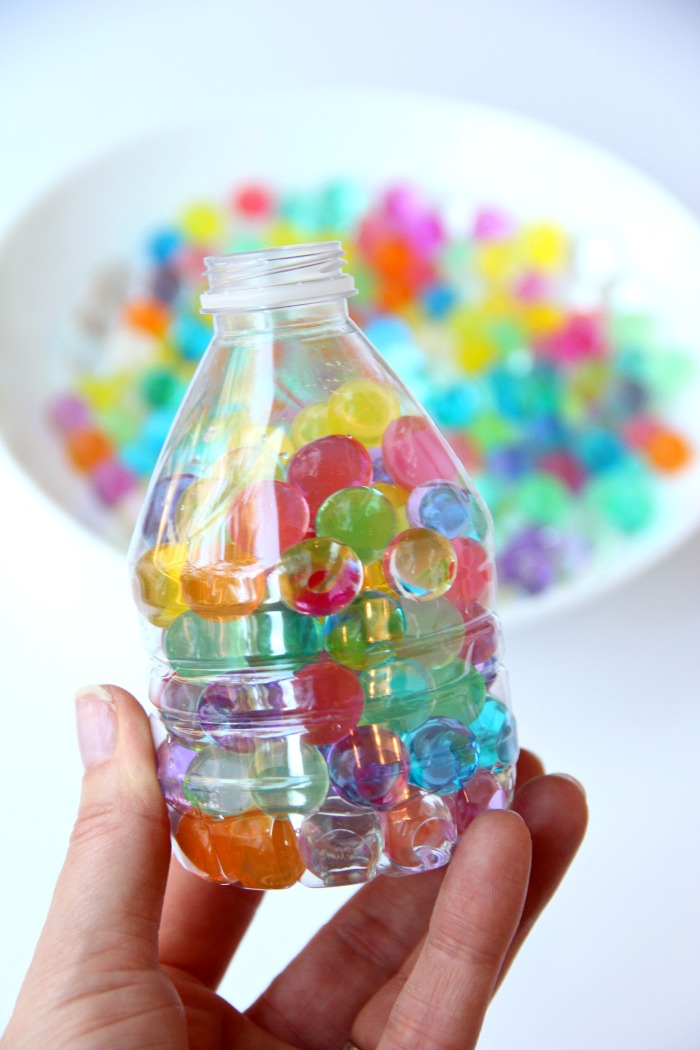 Water Bead Stress Ball - A transparent balloon filled with colorful water beads makes for a soothing and fun kids toy or stress reliever!