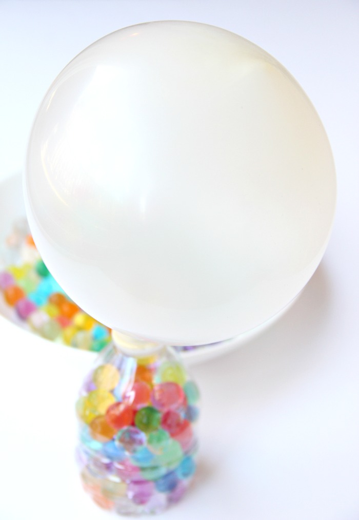 Water Bead Stress Ball - A transparent balloon filled with colorful water beads makes for a soothing and fun kids toy or stress reliever!