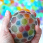 Water Bead Stress Ball - A transparent balloon filled with colorful water beads makes for a soothing and fun kids toy or stress reliever!