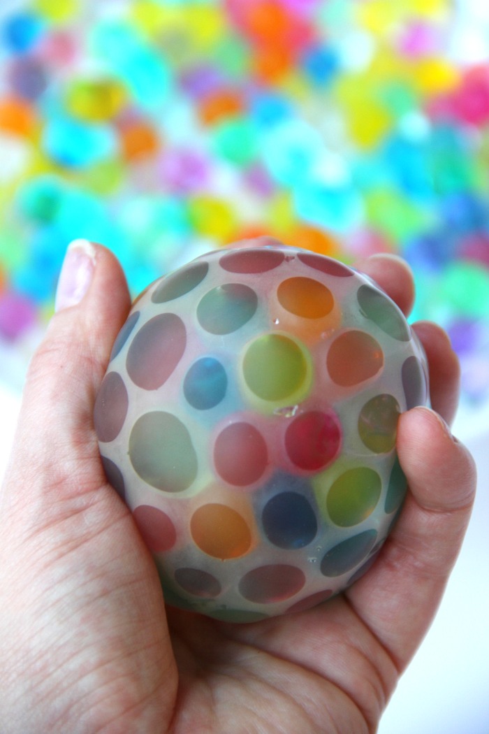 Water Bead Stress Ball - A transparent balloon filled with colorful water beads makes for a soothing and fun kids toy or stress reliever!