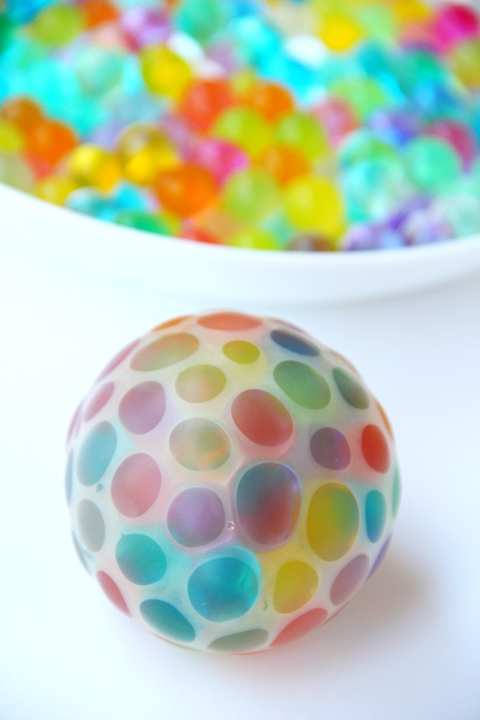Water Bead Stress Ball - A transparent balloon filled with colorful water beads makes for a soothing and fun kids toy or stress reliever!