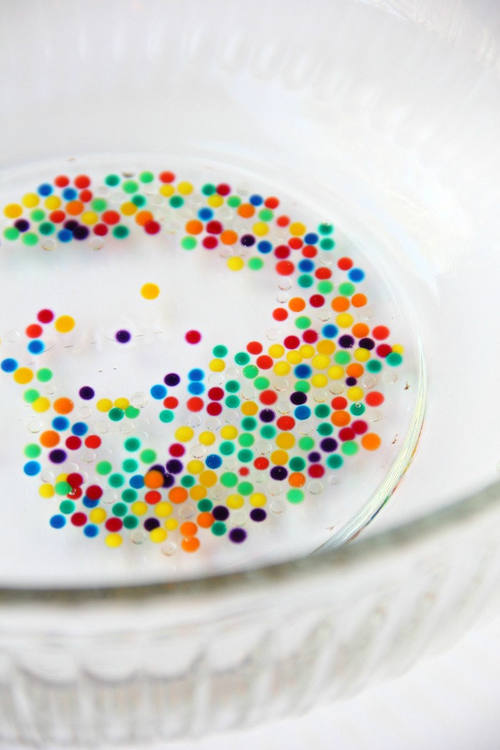 Water Bead Stress Ball - A transparent balloon filled with colorful water beads makes for a soothing and fun kids toy or stress reliever!